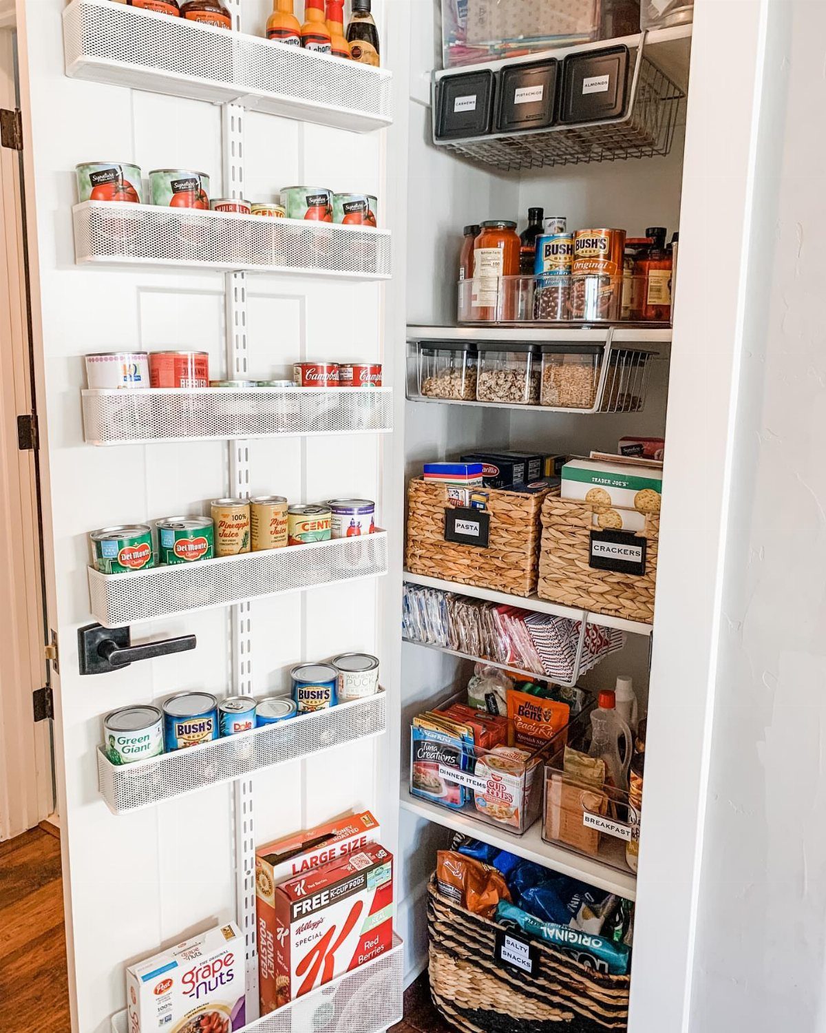 Pantry organization with over-door wire racks and shelves holding snacks and canned goods.