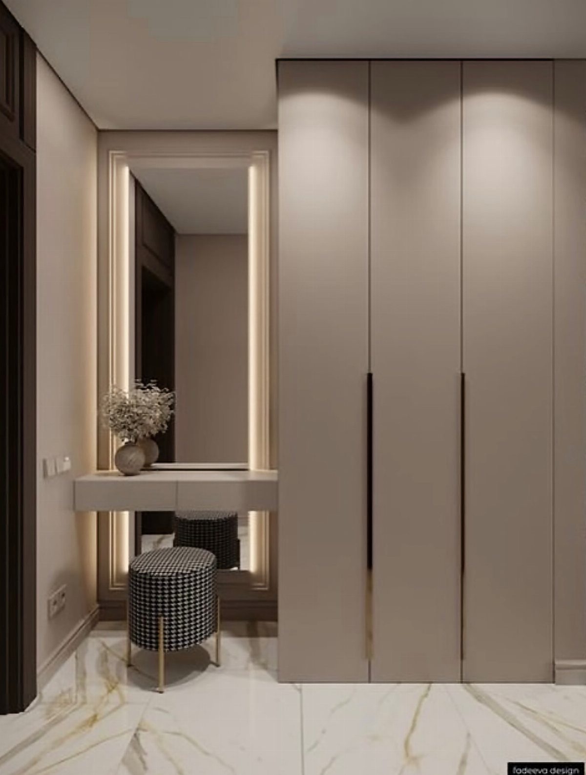 Beige floor-to-ceiling wall unit closet with a matching vanity and houndstooth stool.